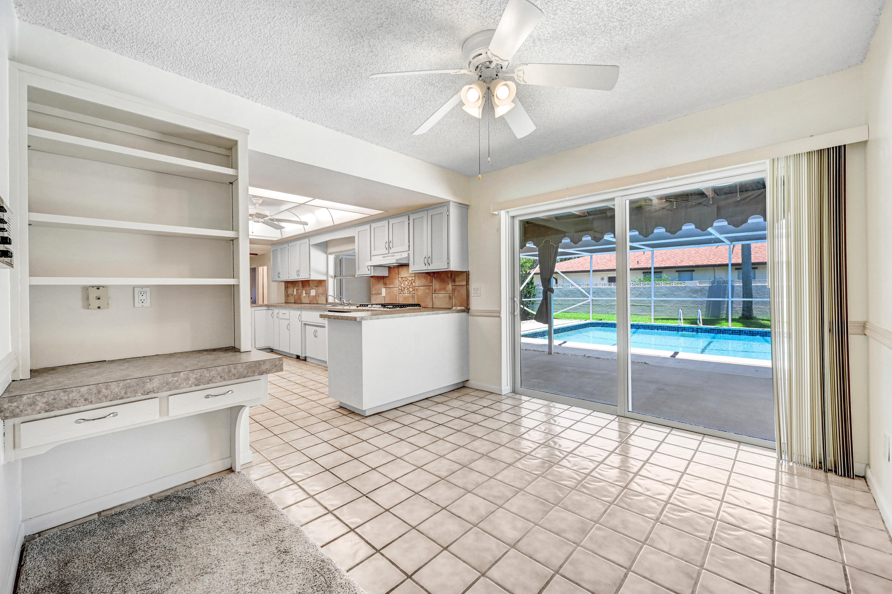 675 Caribbean Road Satellite Beach, FL 32937 - Photo 13 of 35 Pocket Sliders from Kitchen to Pool