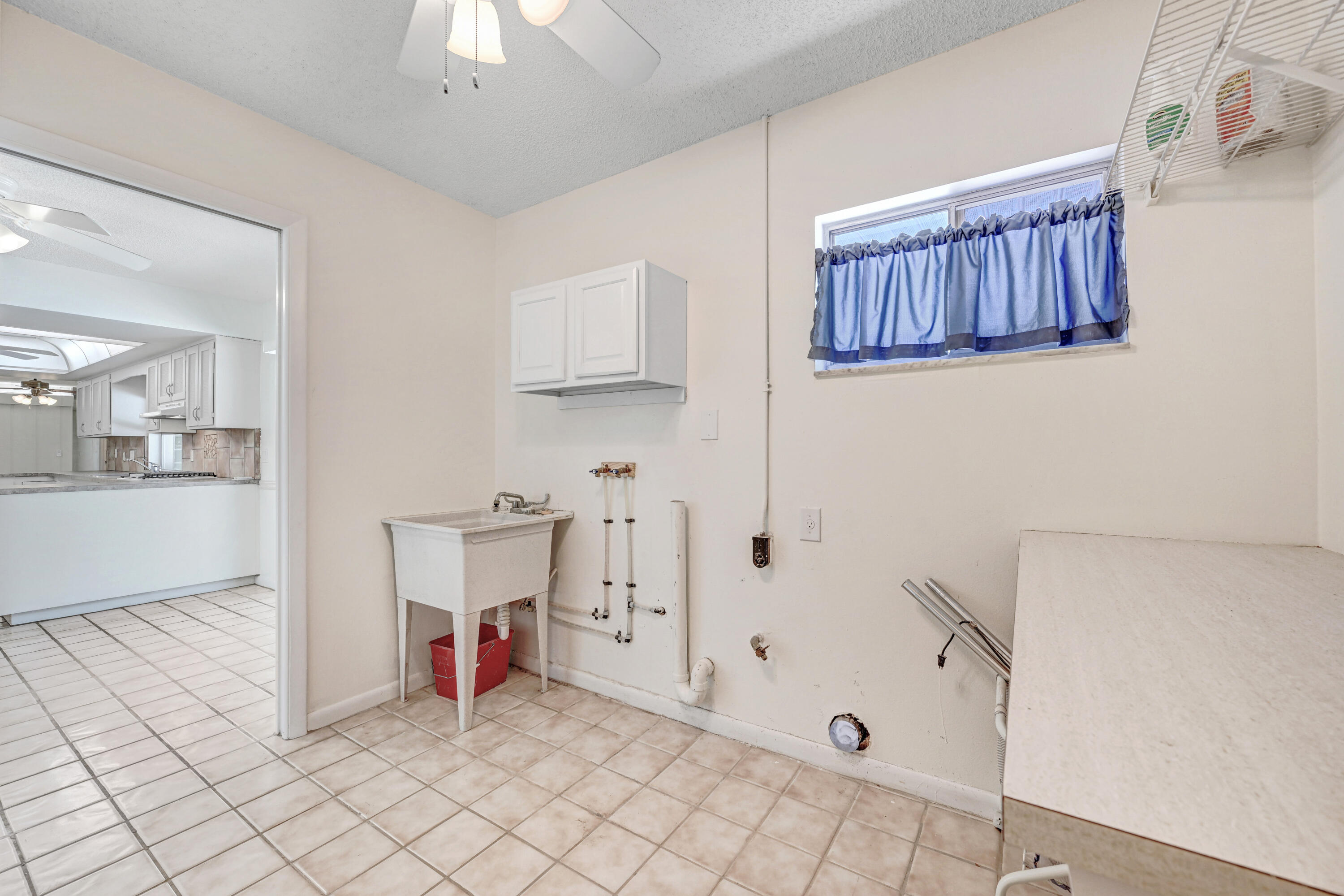 675 Caribbean Road Satellite Beach, FL 32937 - Photo 30 of 35 Spacious Laundry Room