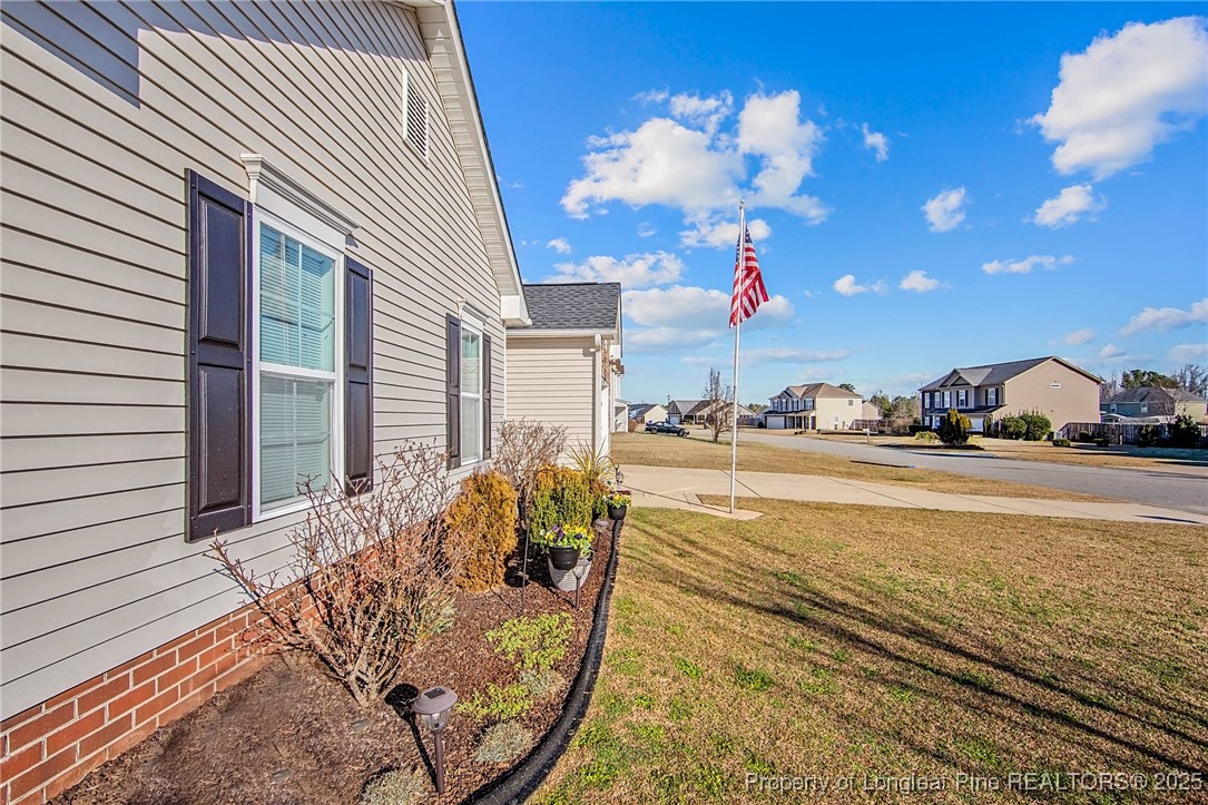 298 Declaration Drive Raeford, NC 28376 - Photo 2 of 31 a view of a balcony with furniture