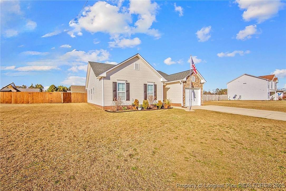 298 Declaration Drive Raeford, NC 28376 - Photo 25 of 31 a house with a ocean view
