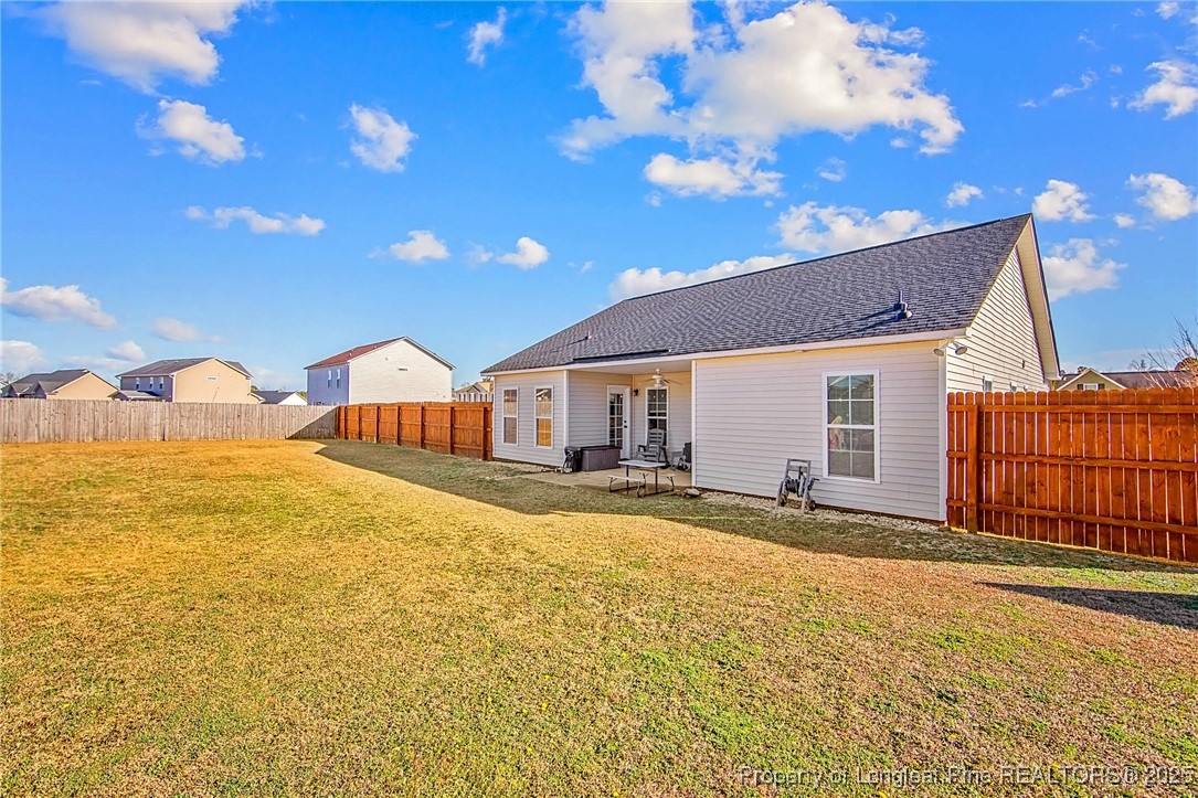 298 Declaration Drive Raeford, NC 28376 - Photo 28 of 31 a view of a house with swimming pool and sitting area