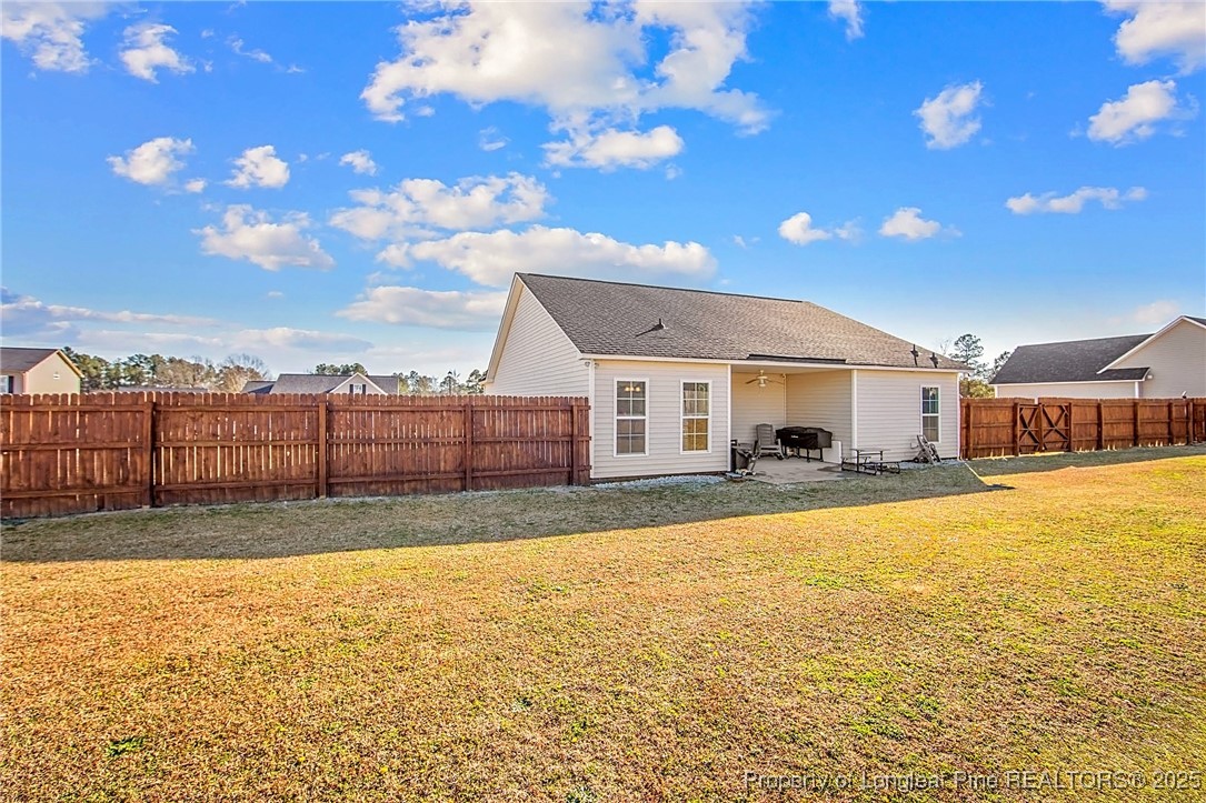298 Declaration Drive Raeford, NC 28376 - Photo 29 of 31 a view of a house with a swimming pool and a yard
