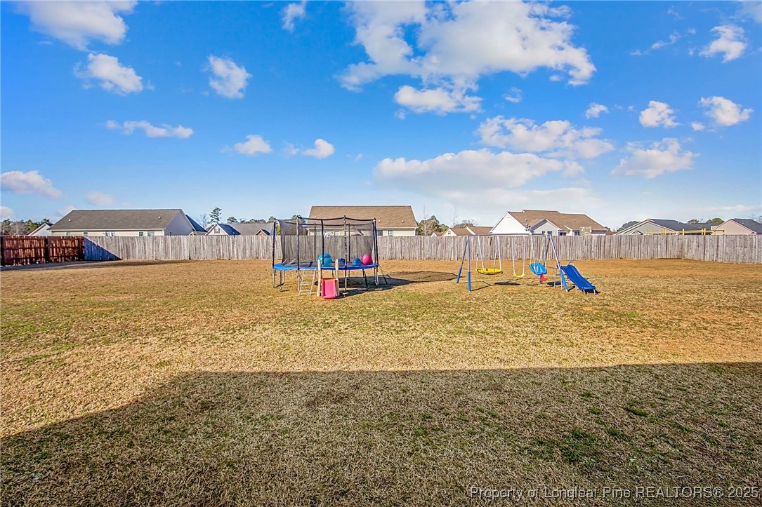 298 Declaration Drive Raeford, NC 28376 - Photo 30 of 31 a view of a lake with a city