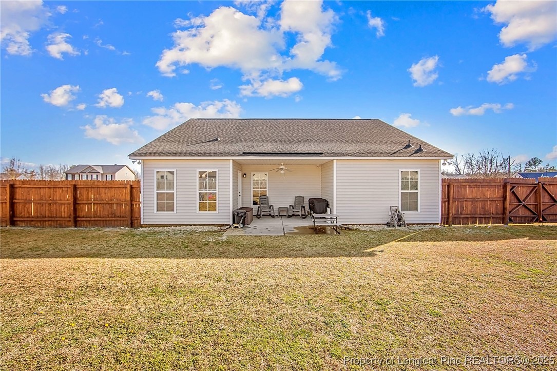 298 Declaration Drive Raeford, NC 28376 - Photo 3 of 31 a view of a house with backyard and sitting area
