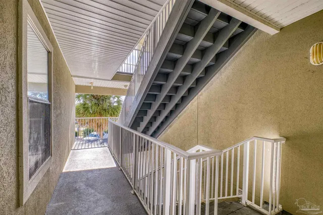 a view of a two chairs in the patio
