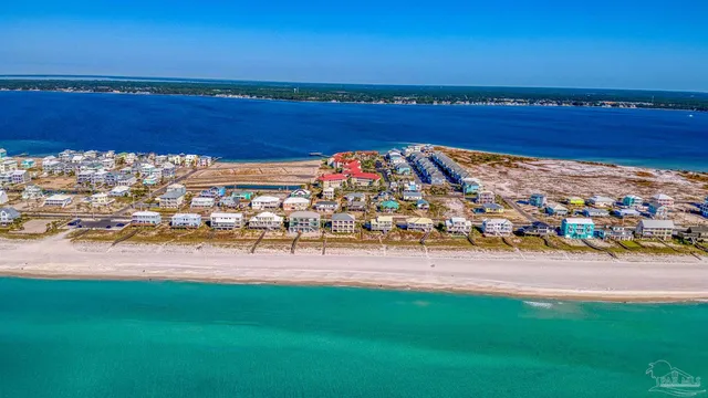 a view of a city with an ocean view