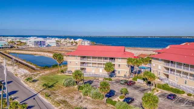 a view of balcony with outdoor seating and city view