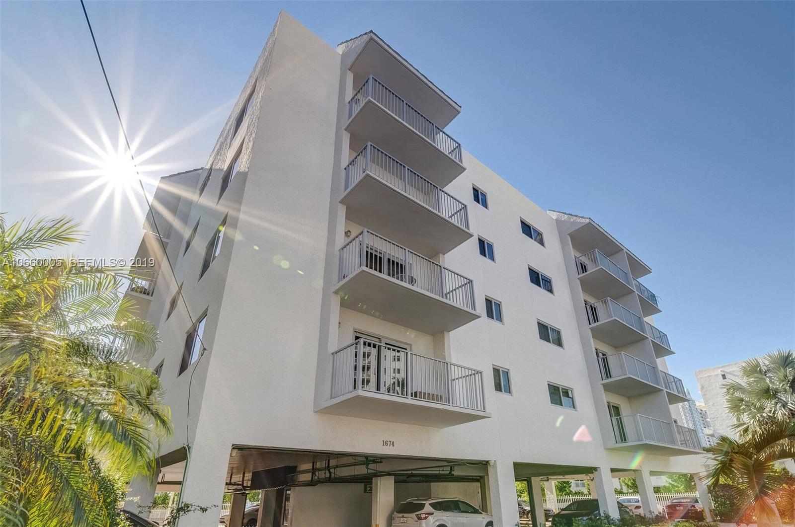 1674 Bay Road, Unit 403 Miami Beach, FL 33139 - Photo 19 of 23 a view of a building