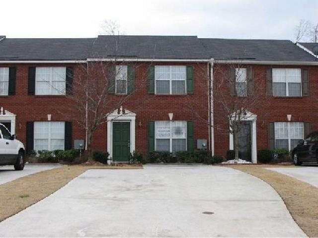 3081 Waldrop Circle Decatur, GA 30034 - Photo 1 of 1 a front view of a building with a yard