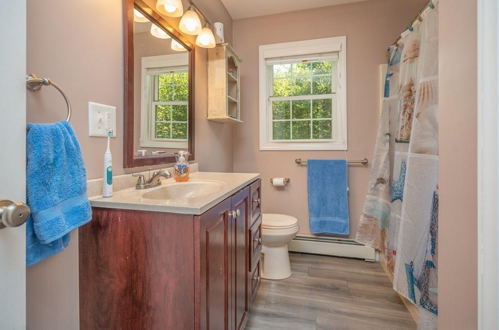 79 Breakneck Road Sturbridge, MA 01566 - Photo 16 of 25 a bathroom with a sink and a toilet