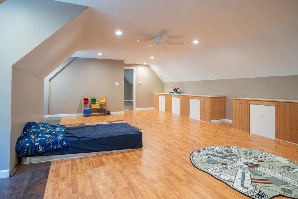 79 Breakneck Road Sturbridge, MA 01566 - Photo 23 of 25 a living room with furniture and a rug