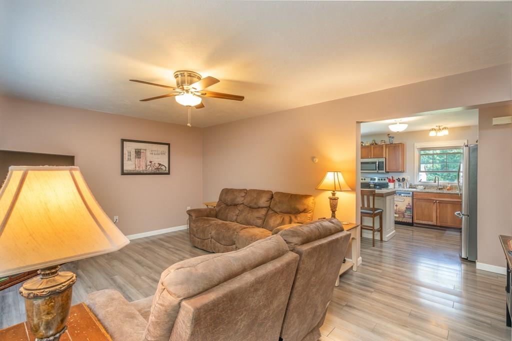 79 Breakneck Road Sturbridge, MA 01566 - Photo 7 of 25 a living room with furniture and a large window