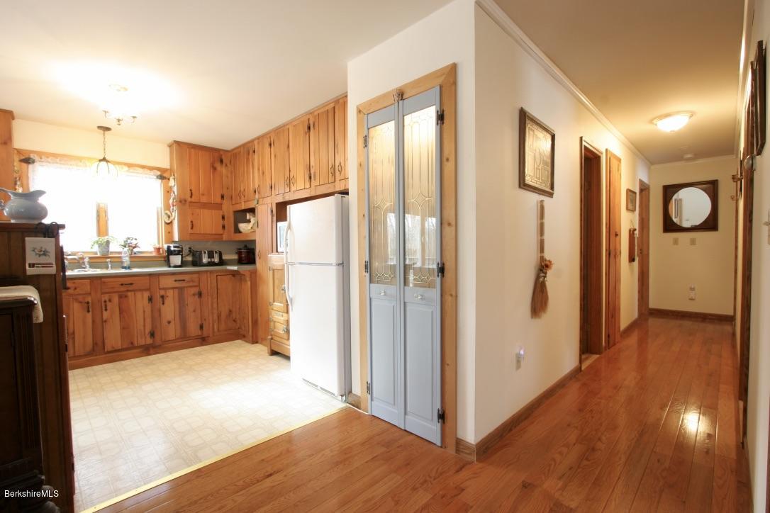 501 Dimmock Road Otis, MA 01253 - Photo 10 of 33 Kitchen and hall to Bedrooms