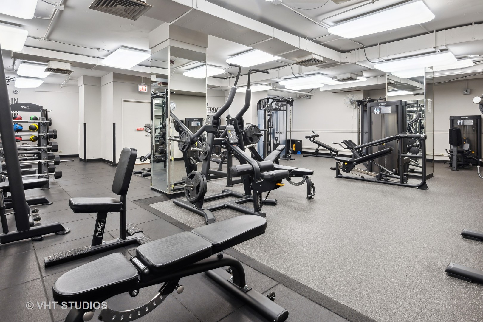 211 East Ohio Street, Unit 609 Chicago, IL 60611 - Photo 14 of 19 a view of a room with gym equipment