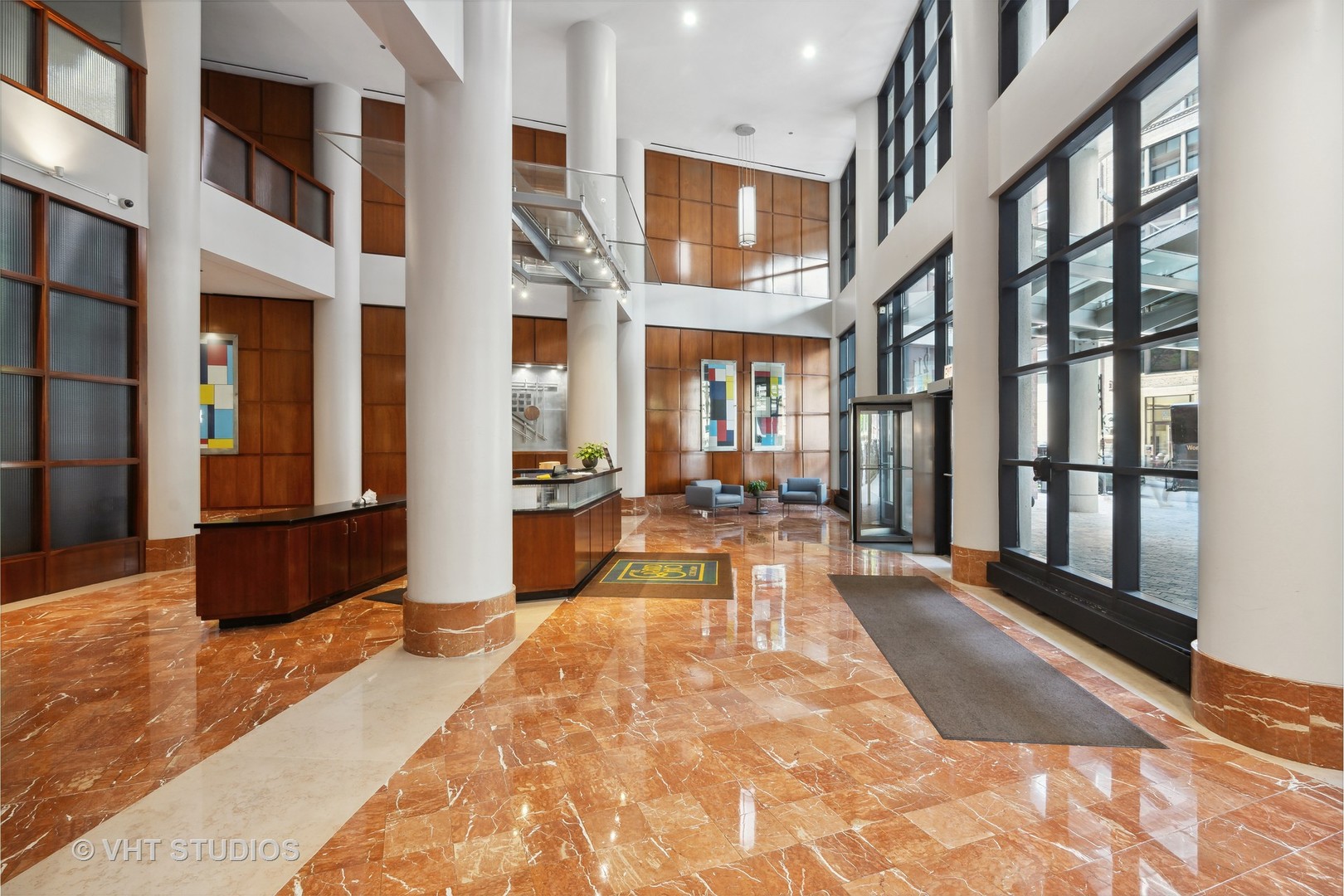 211 East Ohio Street, Unit 609 Chicago, IL 60611 - Photo 10 of 19 a view of a lobby with black carpet