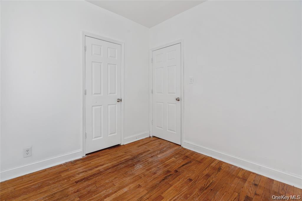 94 Winnikee Avenue, Unit 3 Poughkeepsie, NY 12601 - Photo 7 of 12 a view of empty room with wooden floor