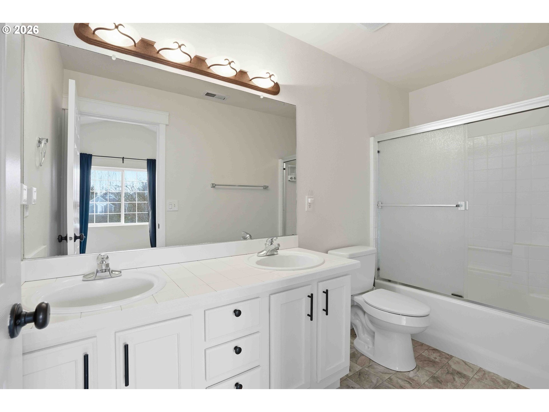 3323 Northwest 31st Circle Camas, WA 98607 - Photo 18 of 25 a bathroom with a sink and a mirror