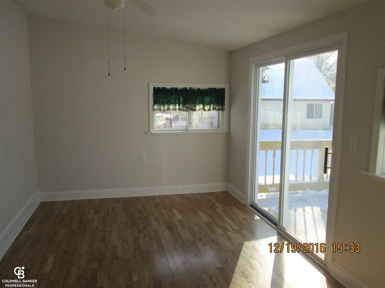 355 North Bailey Street Romeo, MI 48065 - Photo 28 of 47 sunroom