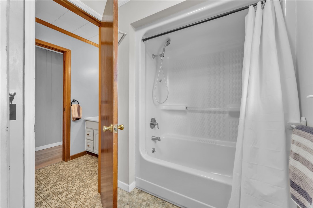 466 Whetstone Road Mountain Rest, SC 29664 - Photo 17 of 31 This bathroom features a shower and tub combination, offering convenience and functional design.