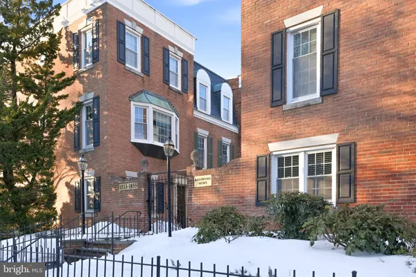 a front view of a multi story residential apartment building