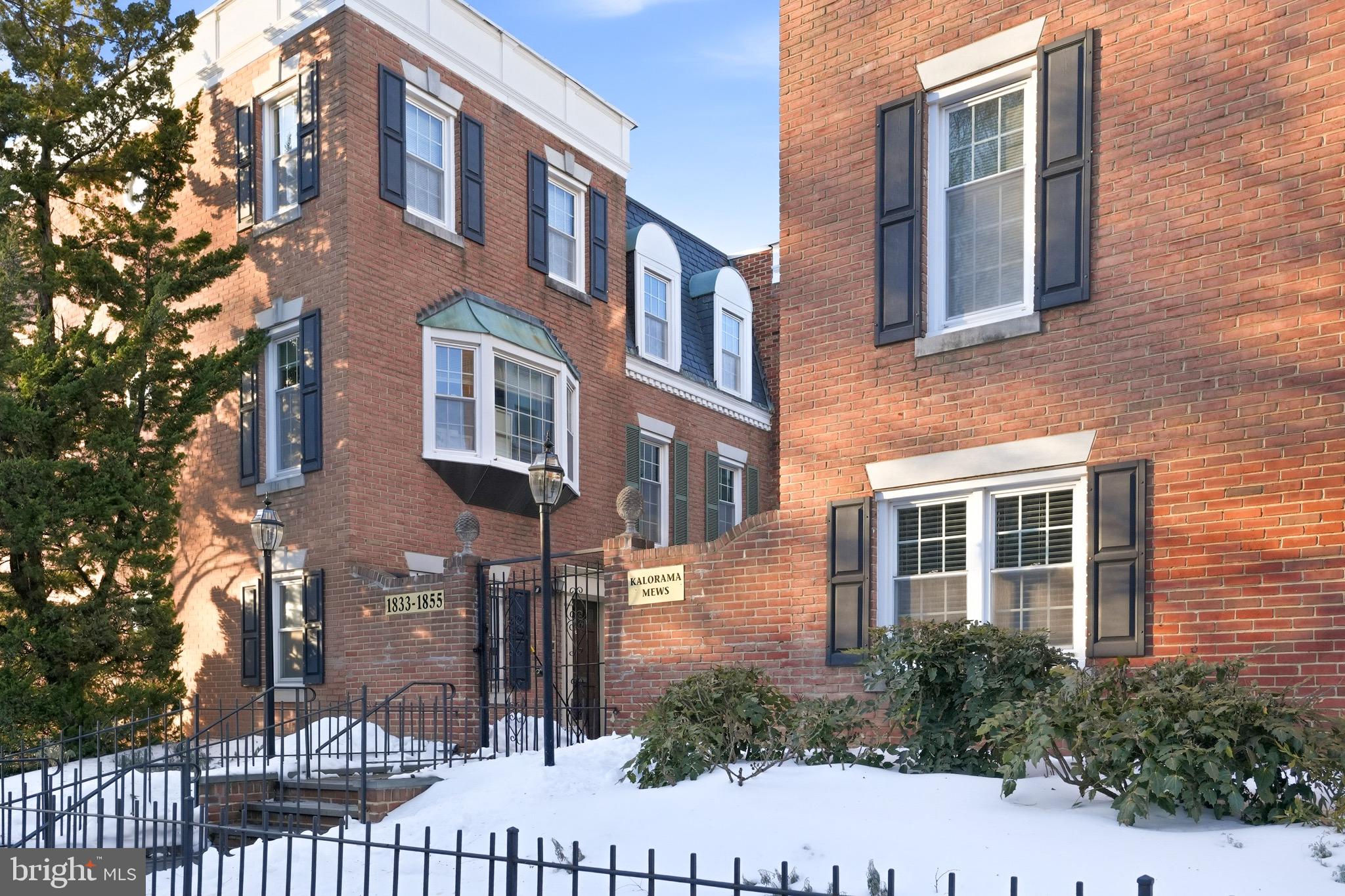 a front view of a multi story residential apartment building