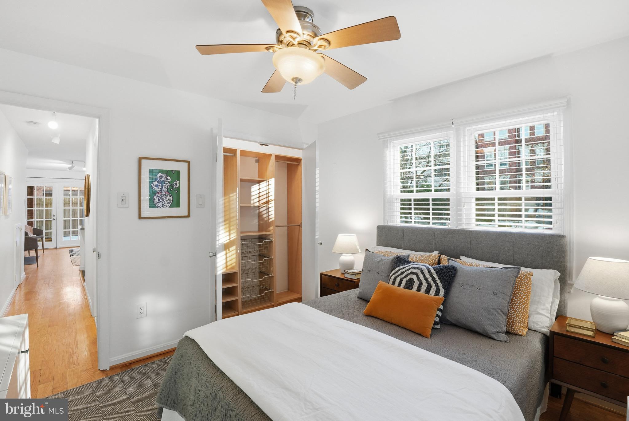 1833-1855 Biltmore Street Northwest, Unit A Washington, DC 20009 - Photo 16 of 22 a bedroom with a large bed and a window