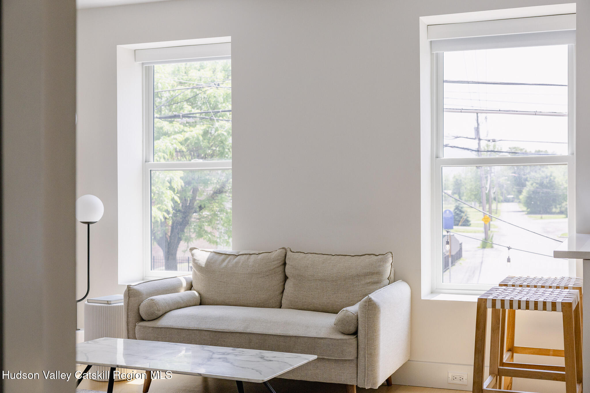 320 Main Street Middleburgh, NY 12122 - Photo 12 of 29 a living room with furniture and a window