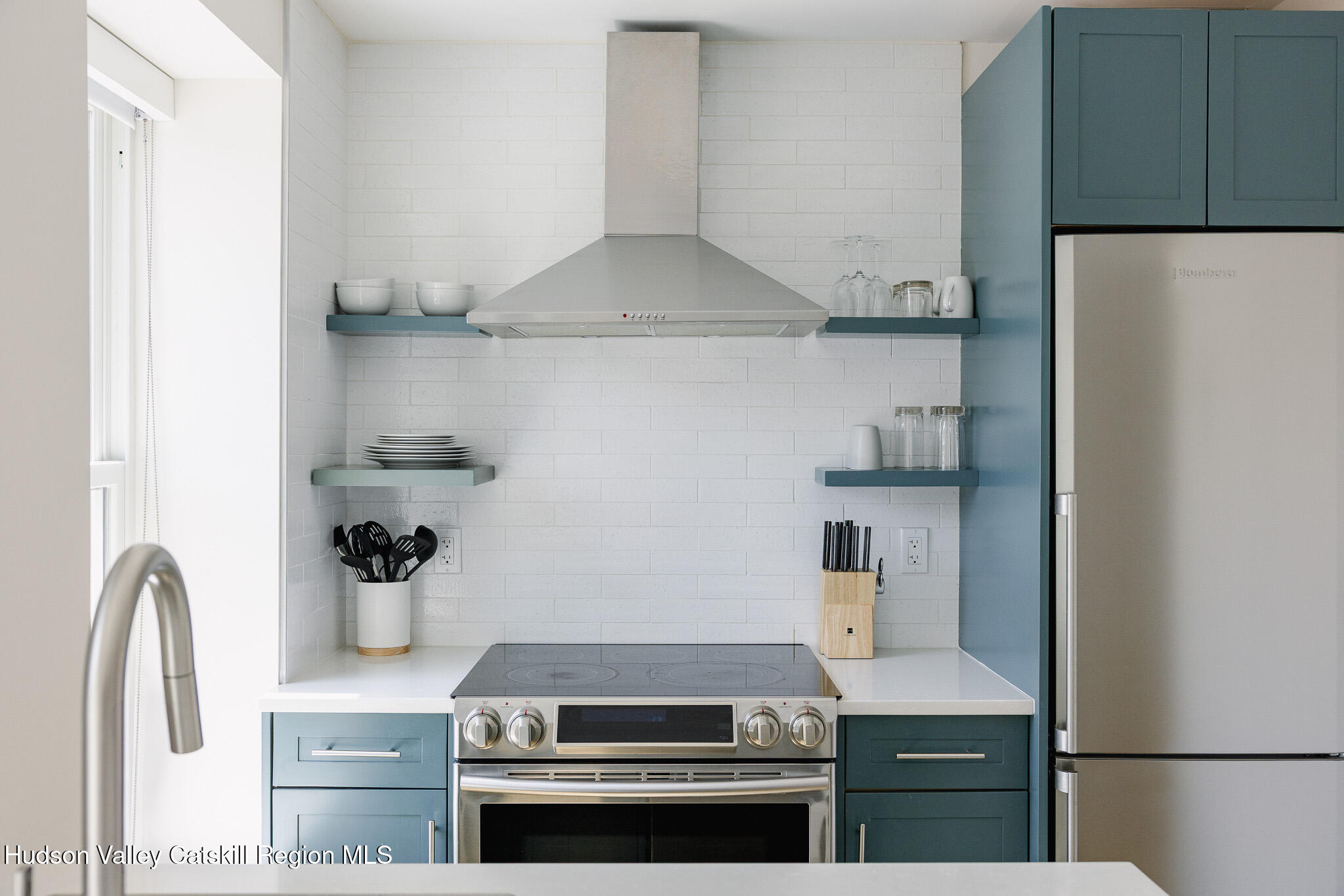 320 Main Street Middleburgh, NY 12122 - Photo 14 of 29 a kitchen with a stove and a refrigerator
