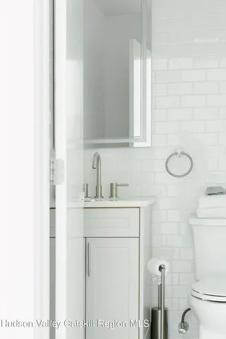 a kitchen with stainless steel appliances a refrigerator and a sink