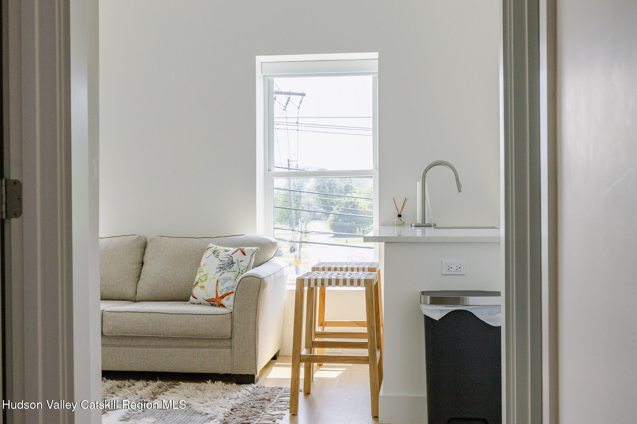 320 Main Street Middleburgh, NY 12122 - Photo 19 of 29 a living room with furniture and a window