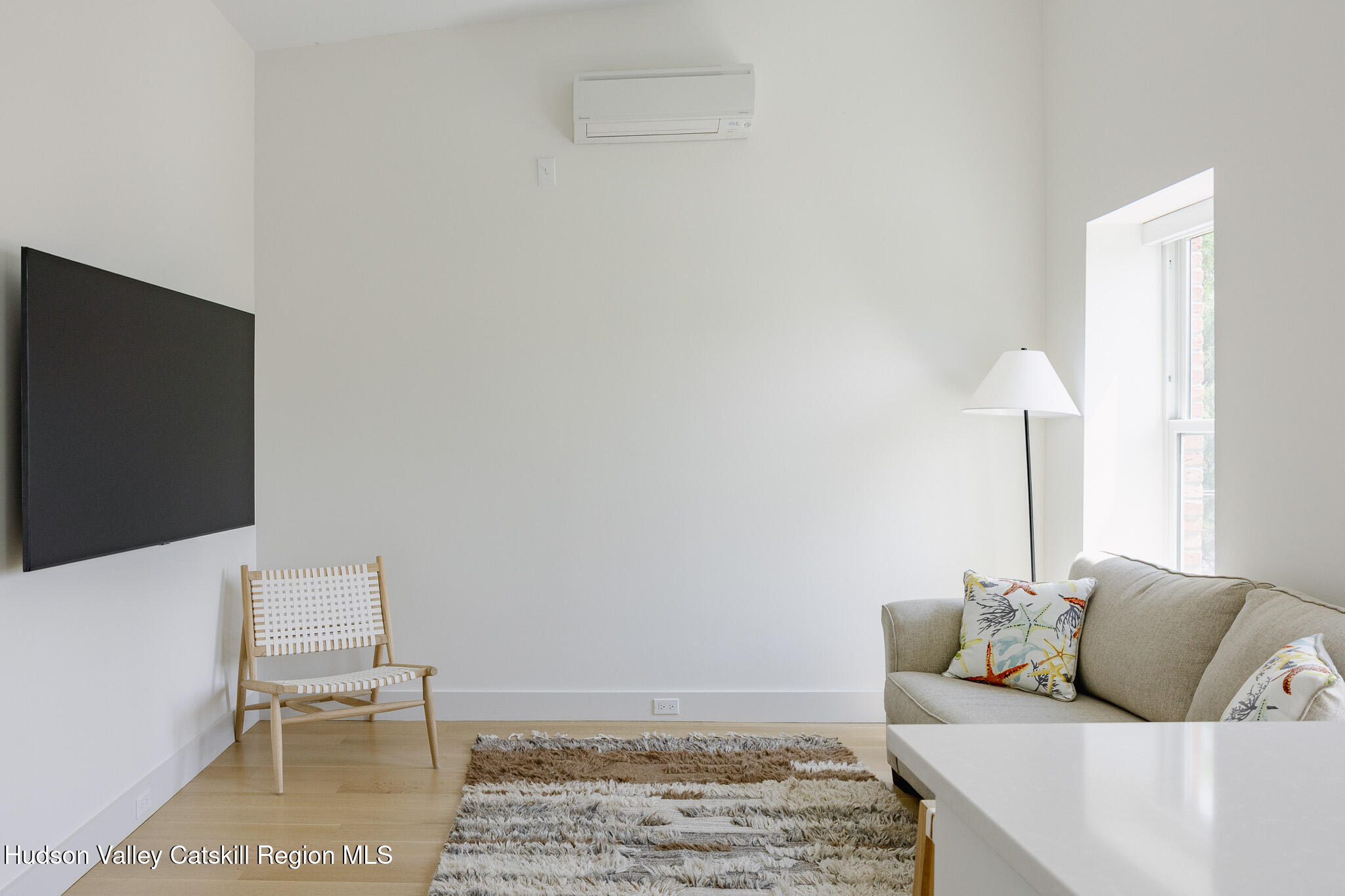 320 Main Street Middleburgh, NY 12122 - Photo 21 of 29 a living room with furniture and a flat screen tv
