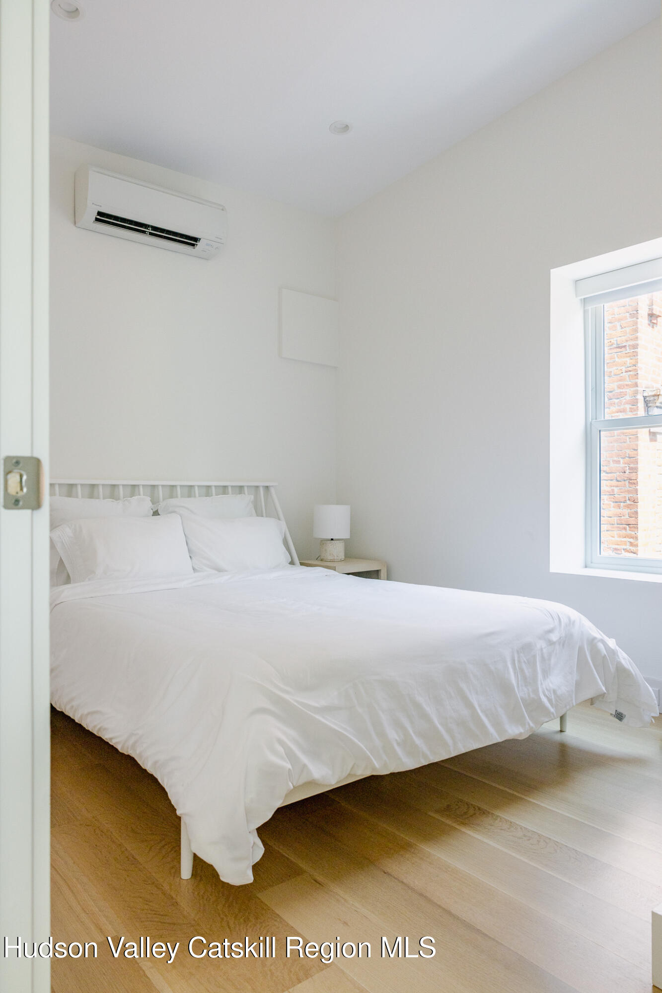 320 Main Street Middleburgh, NY 12122 - Photo 22 of 29 a bedroom with a bed and a night stand