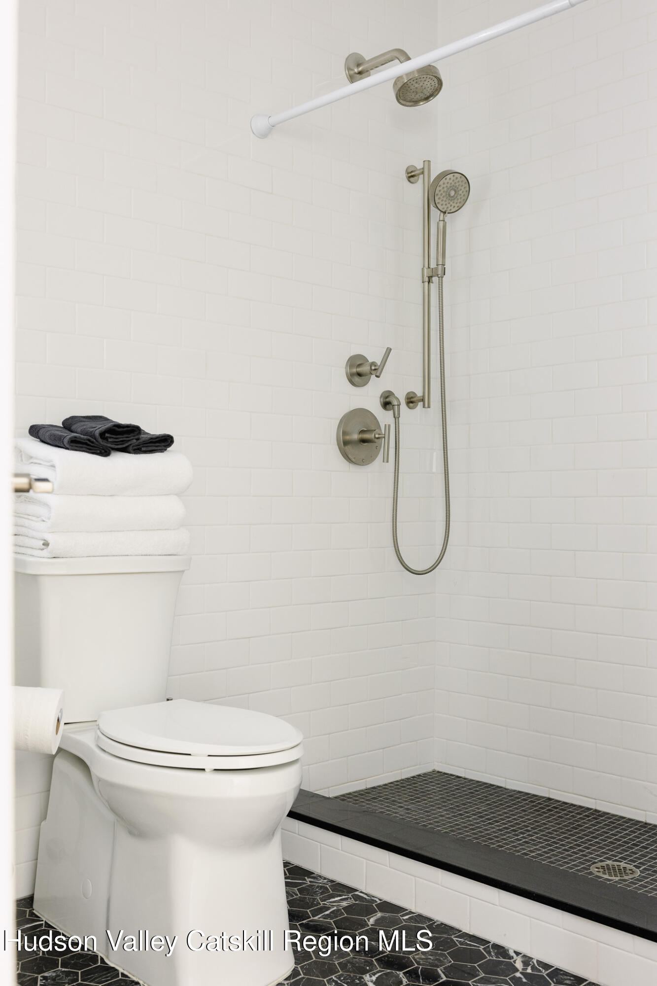 320 Main Street Middleburgh, NY 12122 - Photo 23 of 29 a bathroom with a toilet and a shower