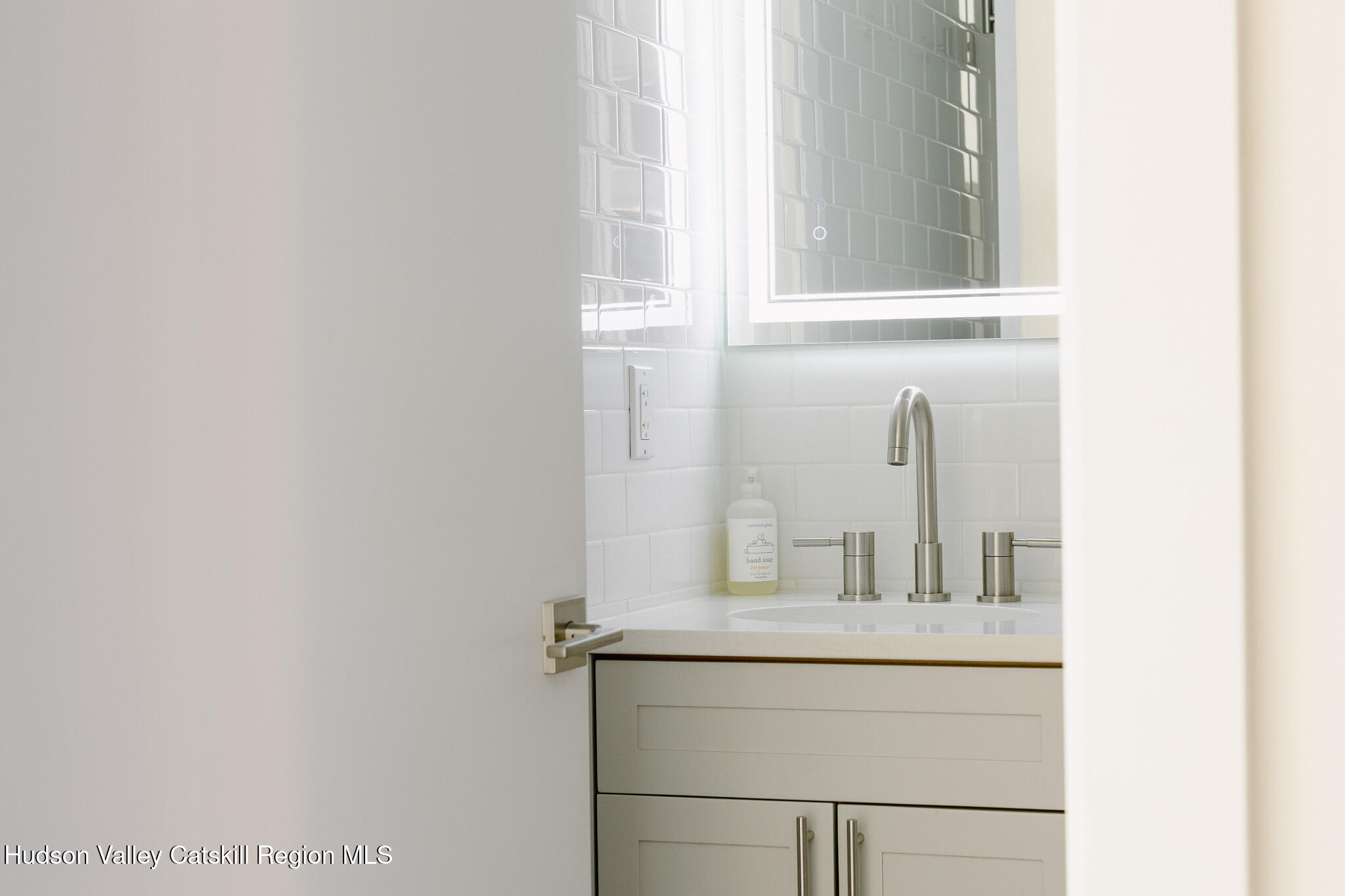 320 Main Street Middleburgh, NY 12122 - Photo 24 of 29 a bathroom with a sink and mirror