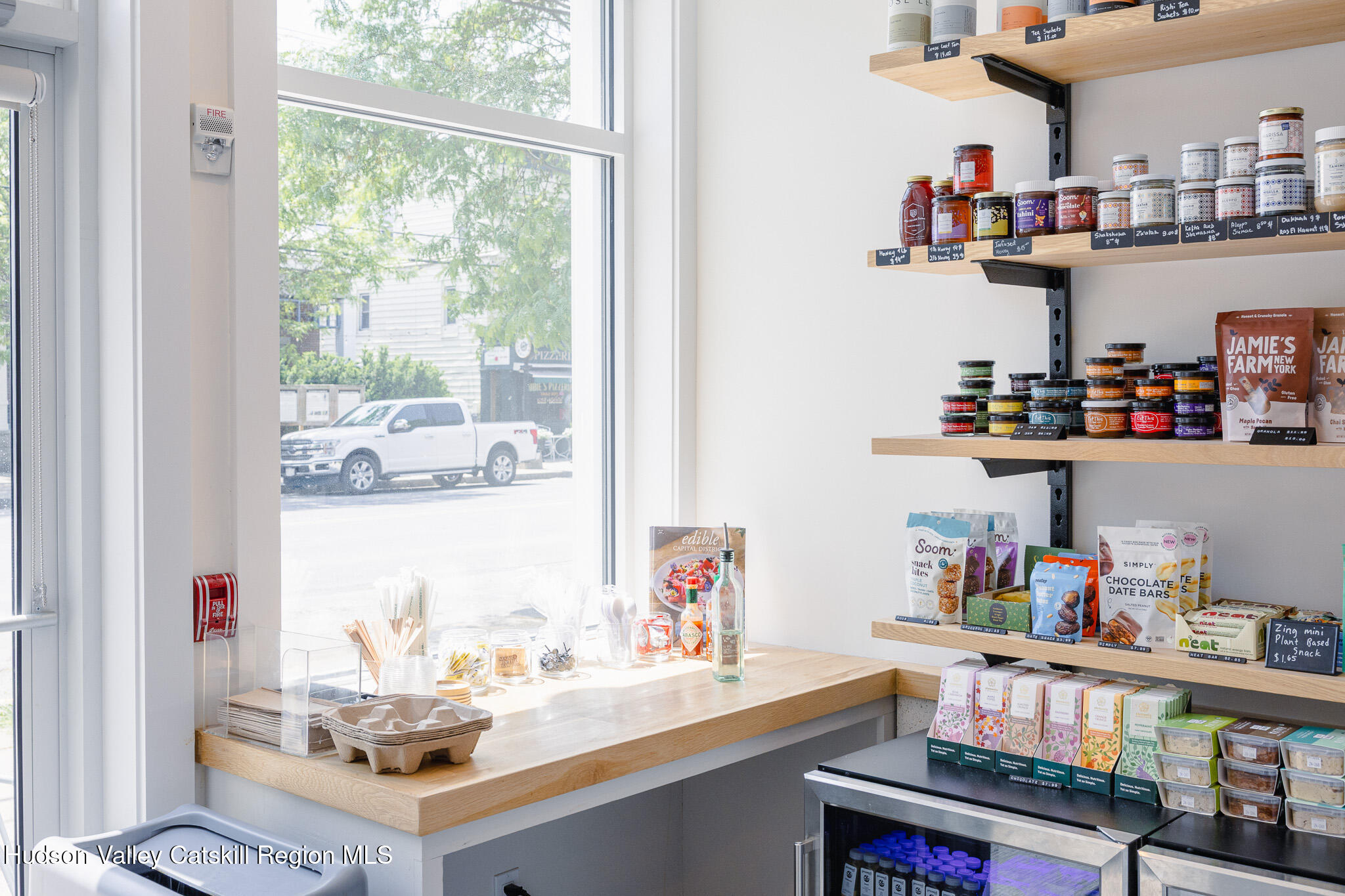 320 Main Street Middleburgh, NY 12122 - Photo 7 of 29 a room with stainless steel appliances a sink and a book shelf