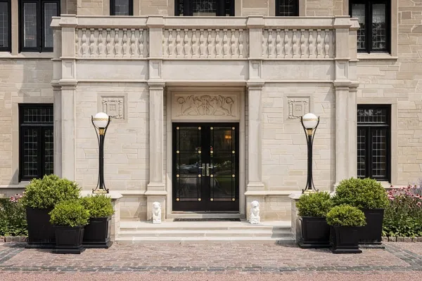 a view of entryway with wooden floor and a front door