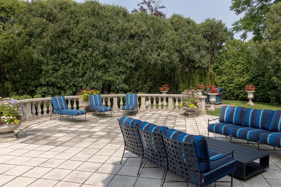 919 Hill Road Winnetka, IL 60093 - Photo 48 of 57 a view of a chair and tables