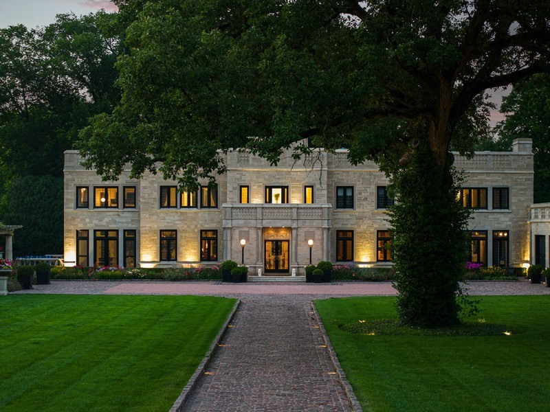 919 Hill Road Winnetka, IL 60093 - Photo 50 of 57 a front view of a house with a yard
