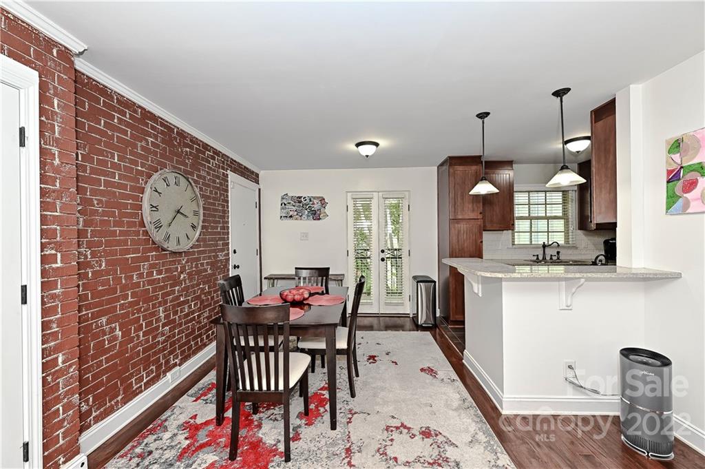 4919 Park Road, Unit D Charlotte, NC 28209 - Photo 6 of 27 a dining room with furniture and window