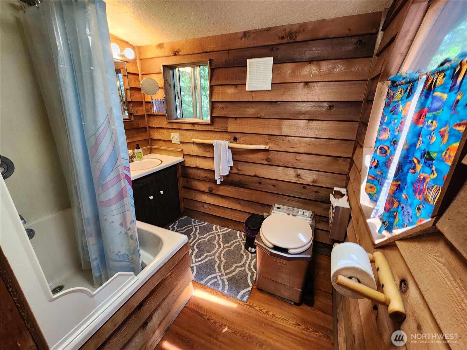 3226 Kelly Road Bellingham, WA 98226 - Photo 26 of 40 a bathroom with a toilet and a sink