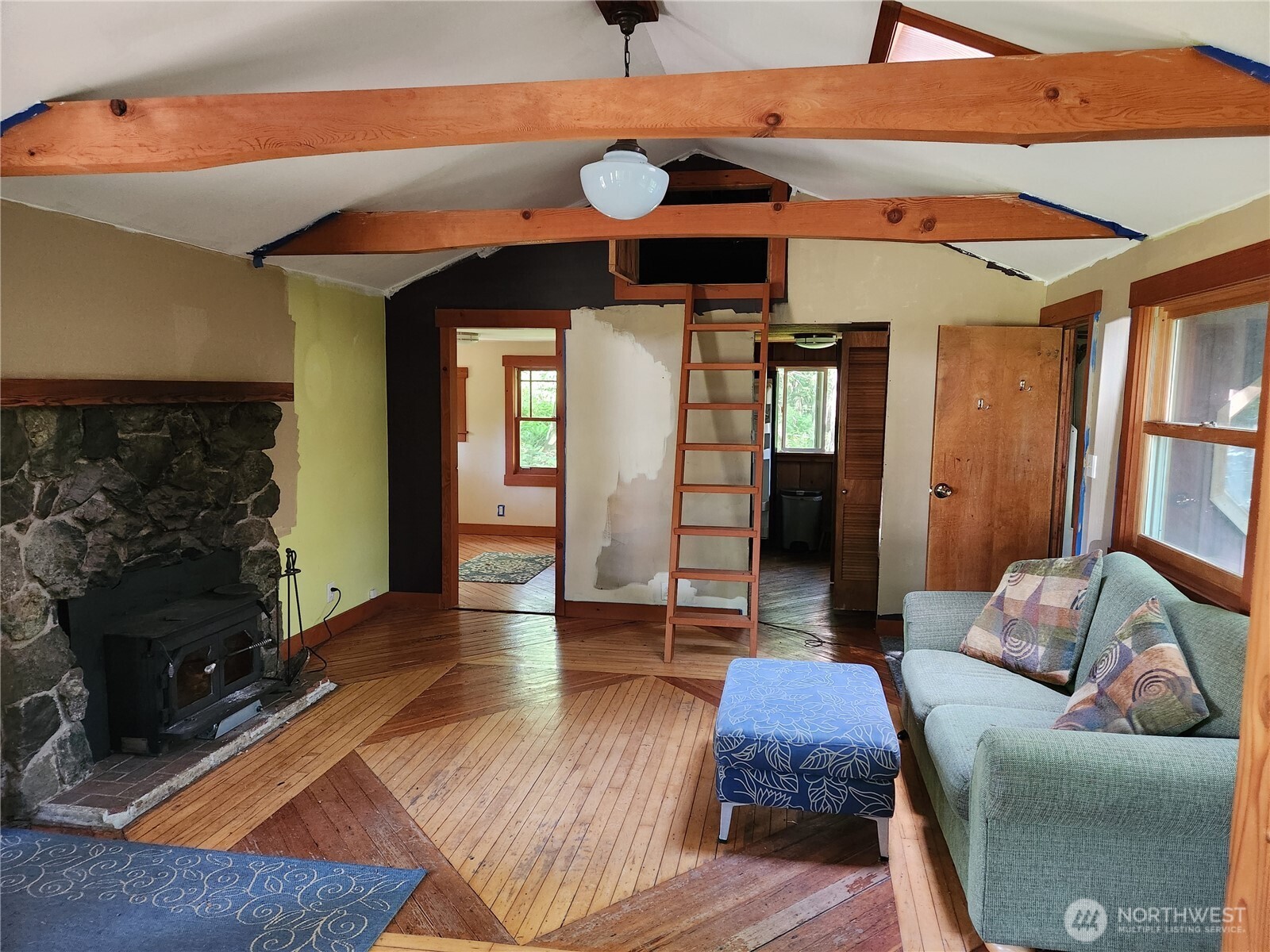 3226 Kelly Road Bellingham, WA 98226 - Photo 31 of 40 a living room with furniture and wooden floor