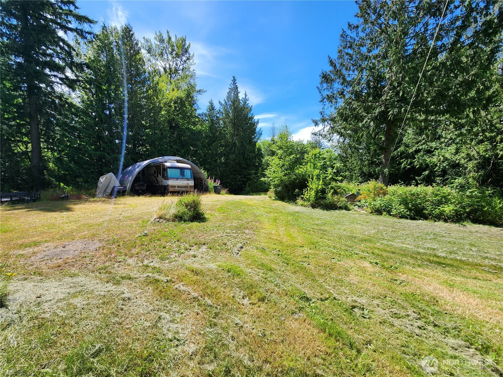 3226 Kelly Road Bellingham, WA 98226 - Photo 36 of 40 a view of a swimming pool with a yard
