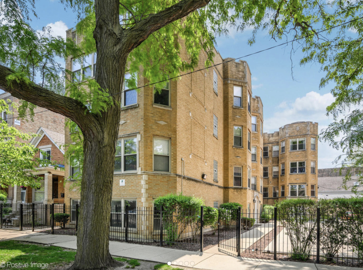 3019 West George Street, Unit 2A Chicago, IL 60618 - Photo 1 of 1 a front view of a building with street view