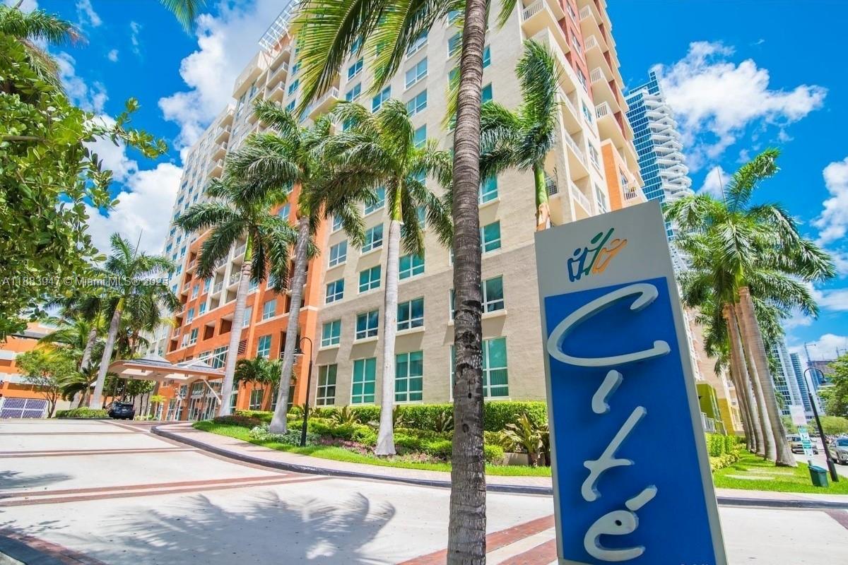 2000 North Bayshore Drive, Unit 1105 Miami, FL 33137 - Photo 2 of 29 a view of building with yard