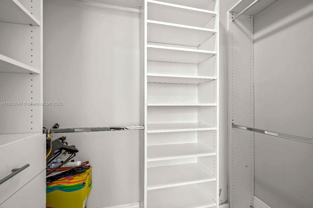 2000 North Bayshore Drive, Unit 1105 Miami, FL 33137 - Photo 22 of 29 a view of walk in closet with empty racks