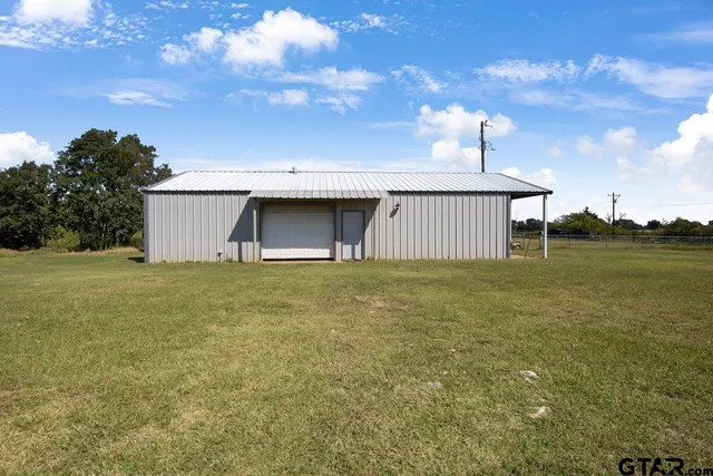 a house view with garden space