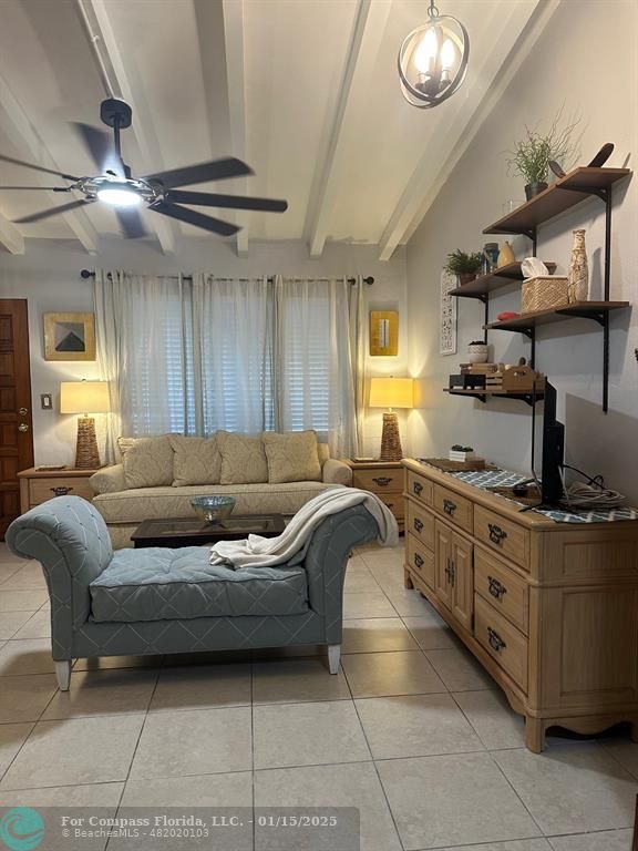 1605 Southwest 25th Street, Unit 4 Fort Lauderdale, FL 33315 - Photo 11 of 14 a kitchen with stainless steel appliances granite countertop a sink and cabinets