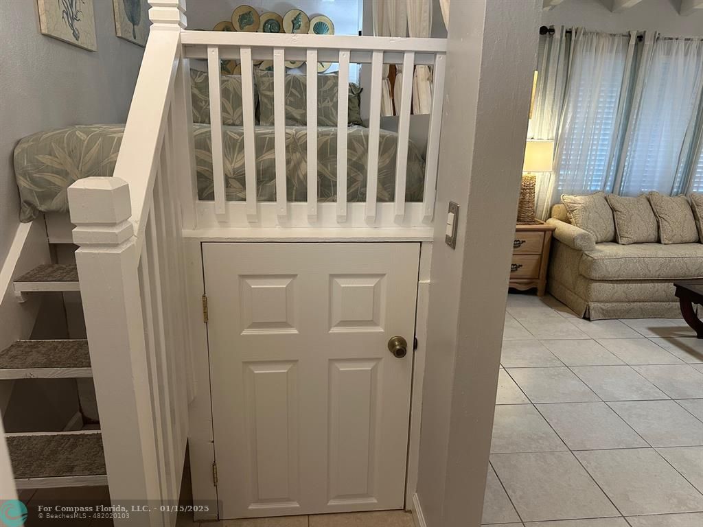 1605 Southwest 25th Street, Unit 4 Fort Lauderdale, FL 33315 - Photo 8 of 14 a view of a porch with furniture