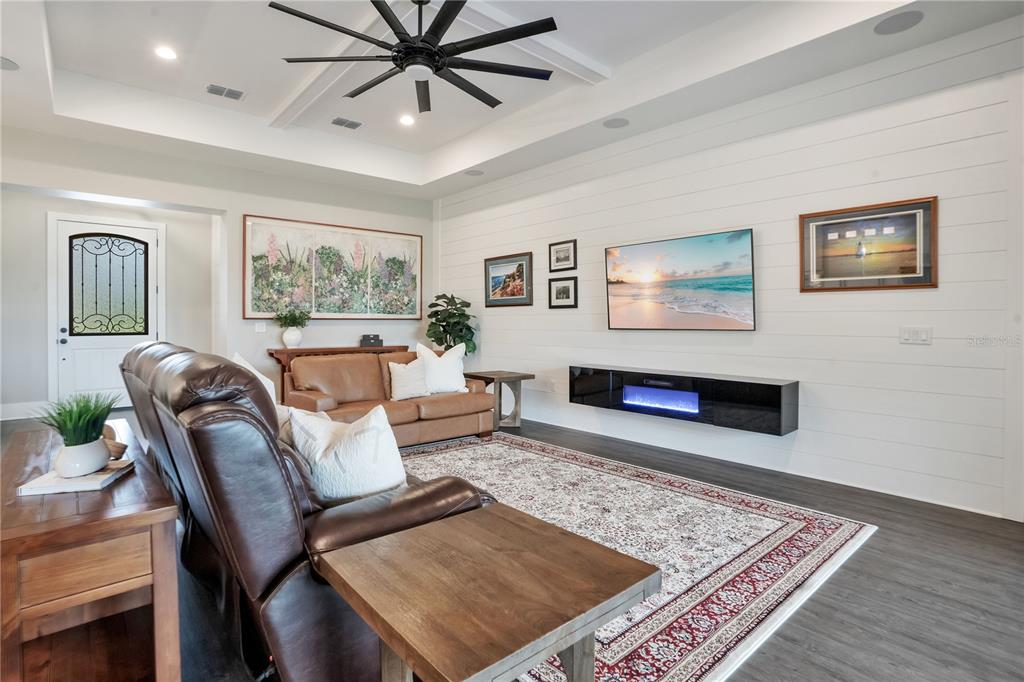 440 Palma Ceia Road Winter Haven, FL 33884 - Photo 22 of 78 a living room with furniture and a rug