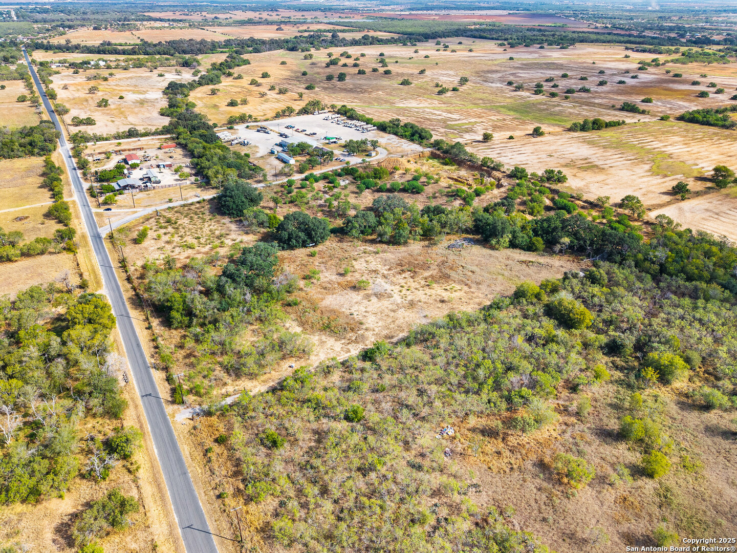 17520 Jackel Road Von Ormy, TX 78073 - Photo 4 of 8 a view of a yard